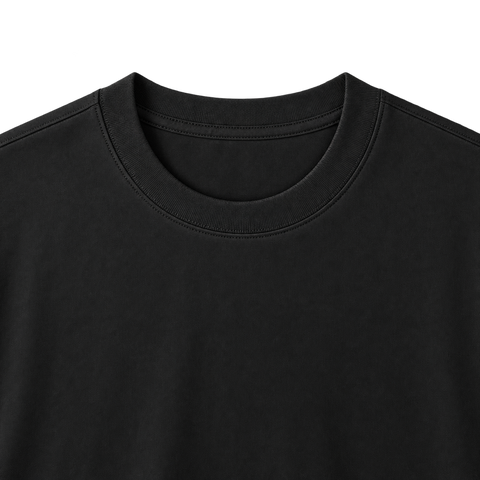 Relaxed Cotton Essential Tee in Black, centered ribbed neckline detail on transparent background